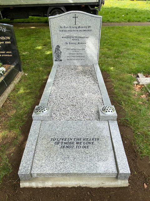 Full kerb memorial with inscription panel to foot.