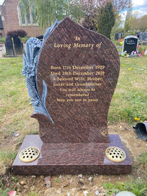 MB117 headstone with carved flowers 