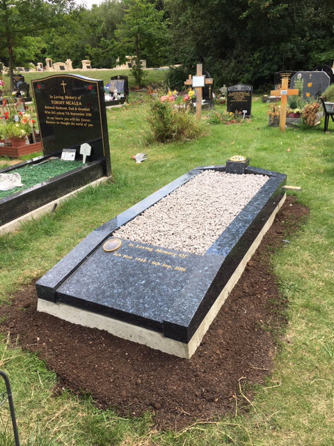 NM209 low rise memorial in blue pearl granite