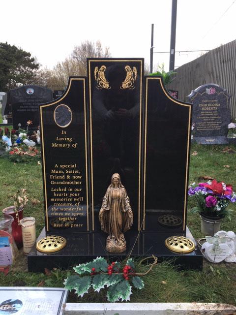 Three panel memorial in black granite