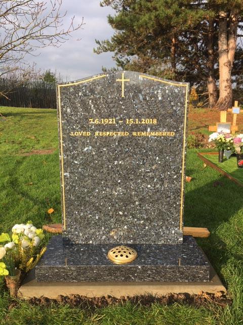 blue pearl granite headstone with gold pinline & cross