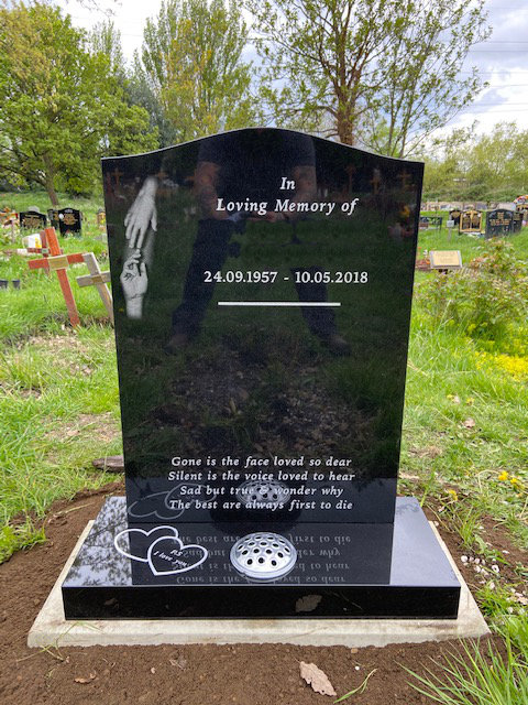 Black Granite Memorial With Etched Hands