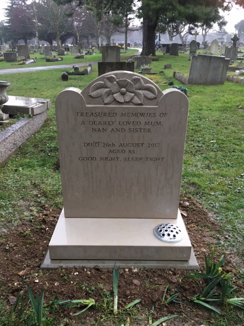 Portland stone memorial with carved poppy